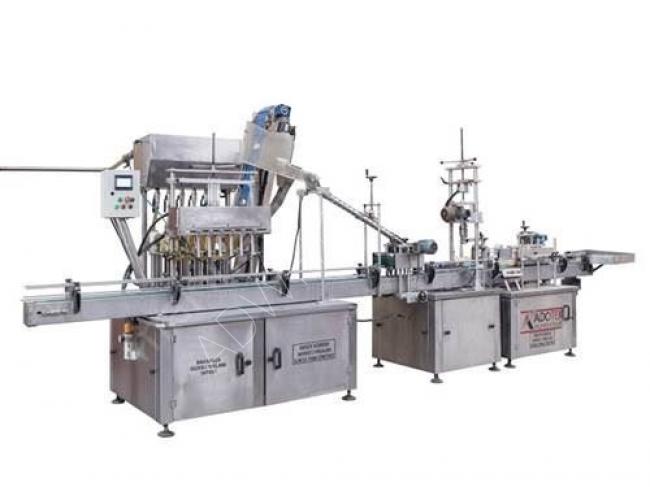 Automatic liquid filling machine for liquid detergents with a capacity of 330-1000 ml