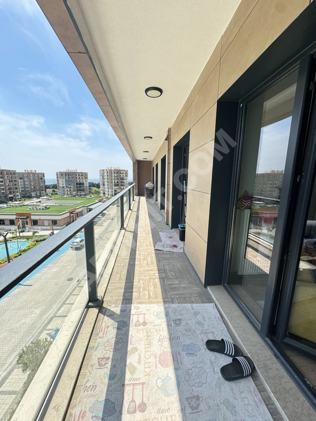 Apartment for urgent sale 3+1 in the Bizim Evler complex with a sea view