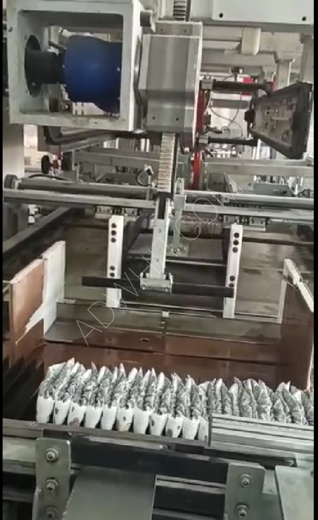 Machine for manufacturing and producing baby diapers