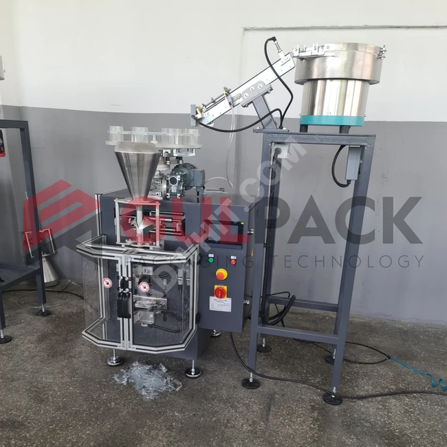 Vertical packaging machine with screw system 20 - 30 pieces/minute