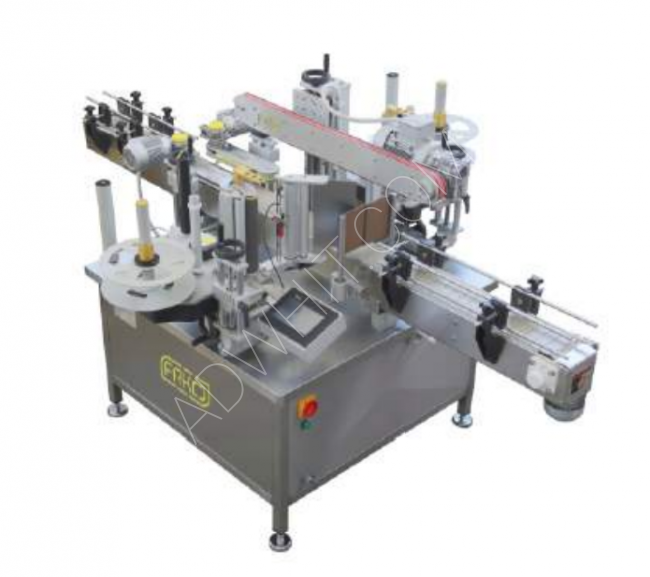 A machine for labeling the front and back surfaces with a capacity of 5000 pieces per hour