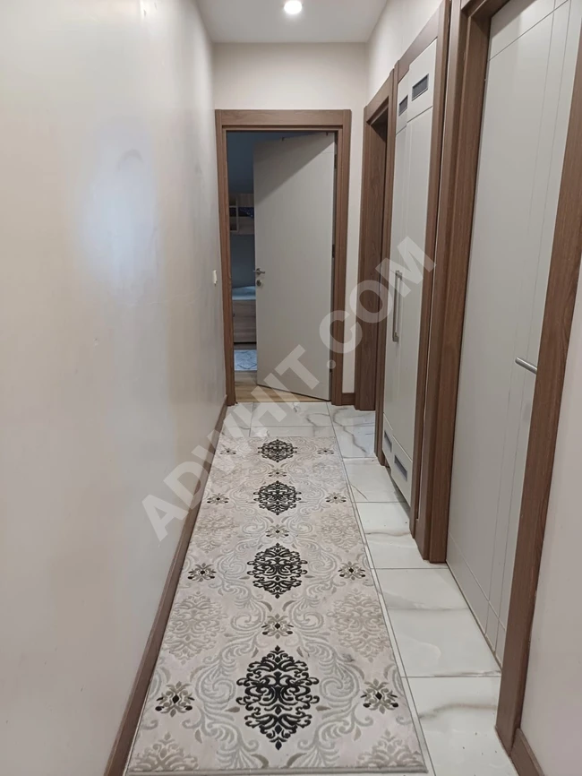 A 2+1 furnished apartment for sale in the Reference Bahçeşehir complex