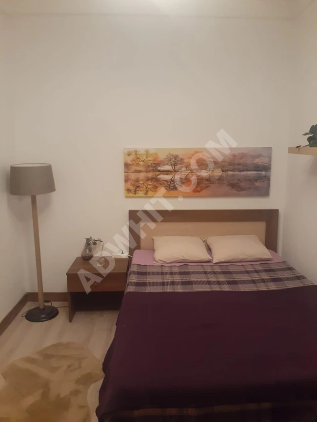 1+1 apartment for sale with furniture in Bahçeşehir