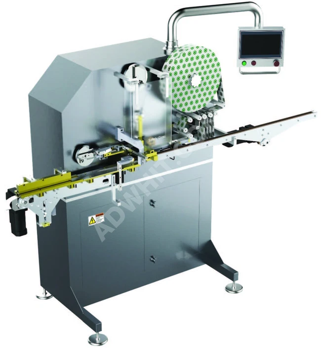 A machine for packing and packaging bouillon cubes with a production rate of 200-220 cubes per minute