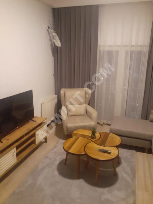 1+1 apartment for sale with furniture in Bahçeşehir