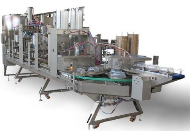 A linear machine for filling ice cream cups with a capacity of 15,000 units per hour