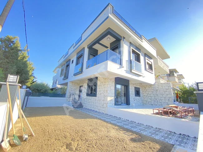 Luxury 4+1 villa for sale near the sea in Doğanbey