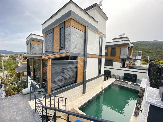 Independent villa 4+1 with private pool and fully furnished for sale in Urkmaz