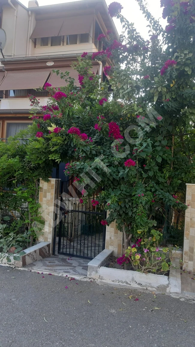 Furnished detached villa 5+1 for sale in Doğanbey, 350 meters away from the sea