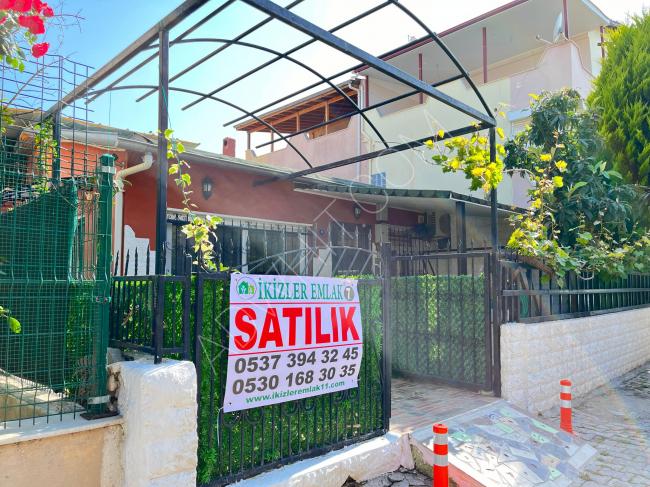 In Urkmez, 100 meters from the sea, a single-story independent house 2+1 for summer rent
