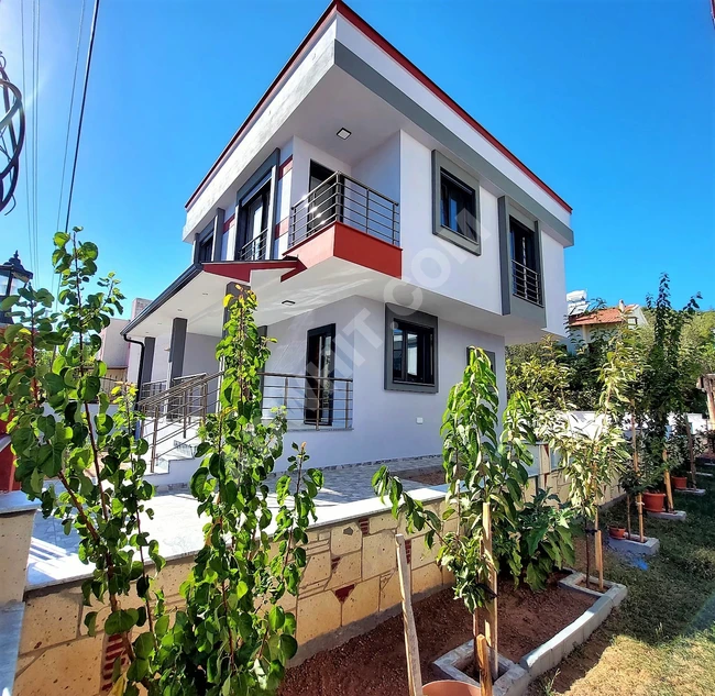 Independent 3+1 summer apartment with a garden for sale in Dogan Bey