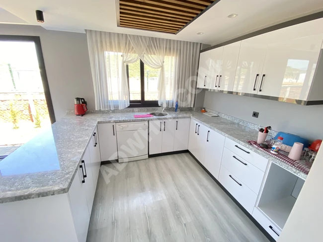 Summer house ready for sale consisting of two rooms and a living room on a 300 square meter plot in Doğan Bey