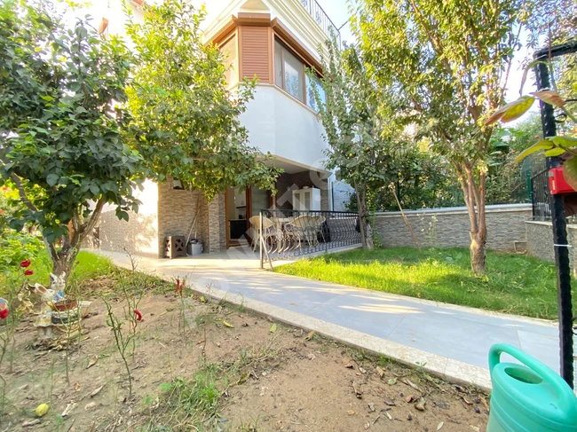 Villa 3+1 for sale in Doğanbey with a large garden, near the sea