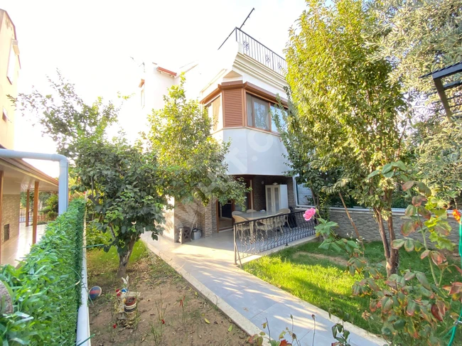 Villa 3+1 for sale in Doğanbey with a large garden, near the sea