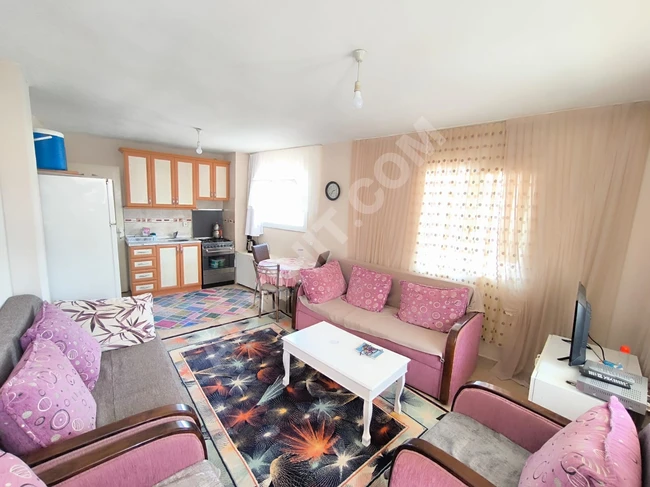 2+1 apartment for sale near the sea in Urkmez Market Center