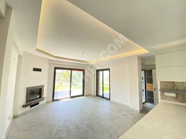 Independent 4+1 villa with a luxurious pool and fireplace for sale in Akarca