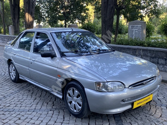 FORD ESCORT 1.6 CLXİ car with a tracking system operating on liquid gas.