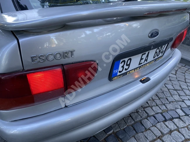 FORD ESCORT 1.6 CLXİ car with a tracking system operating on liquid gas.