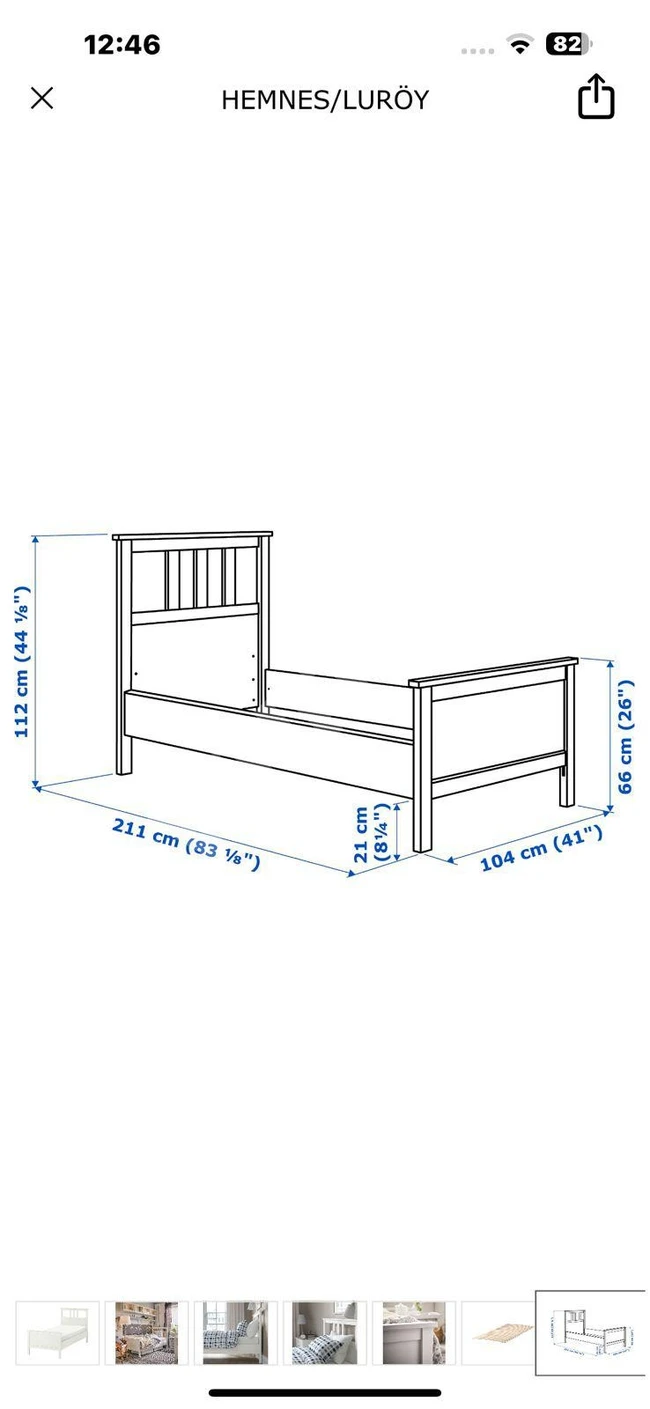 Black wooden bed from IKEA brand