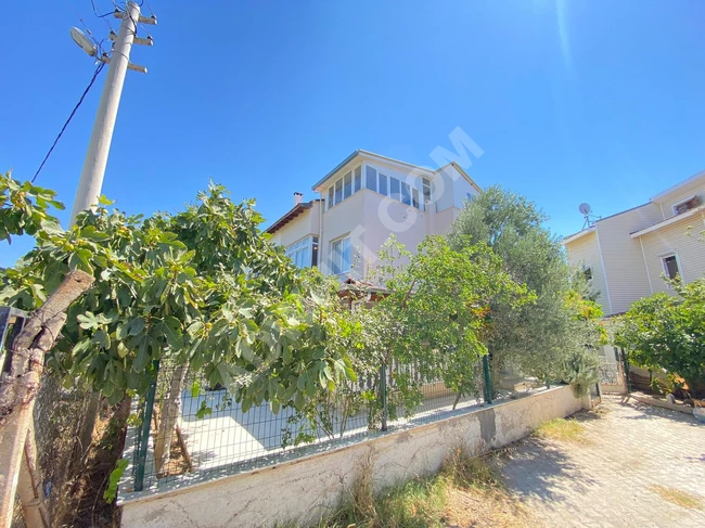 Independent villa for sale at a reasonable price in Doğan Bey, featuring a large garden, four rooms, and a living room