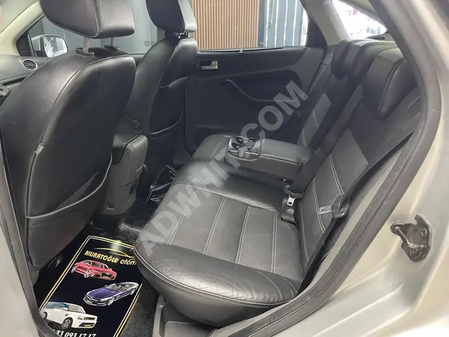 2009 Focus 1.6 Automatic Titanium with a sunroof on gas