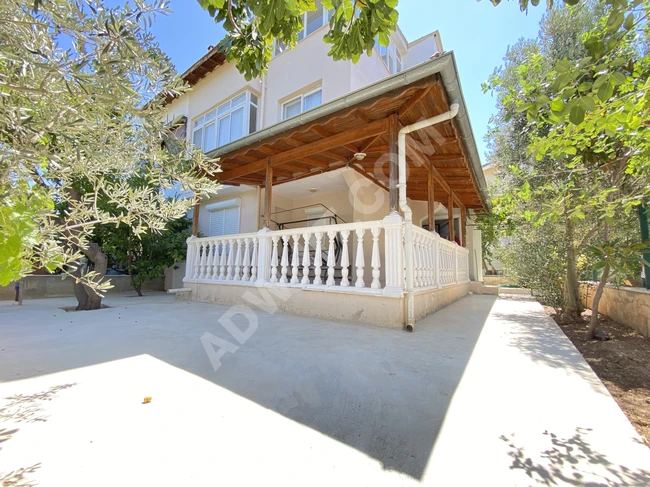 4+1 villa for sale in Doğanbey, close to the sea, with a garden, at a reasonable price