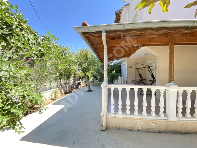 4+1 villa for sale in Doğanbey, close to the sea, with a garden, at a reasonable price