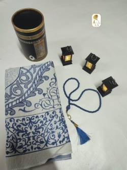 The Kaaba painting box contains a prayer rug + a rosary
